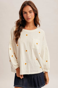 Daisy embroidered long sleeve top in cream with yellow floral embroidery