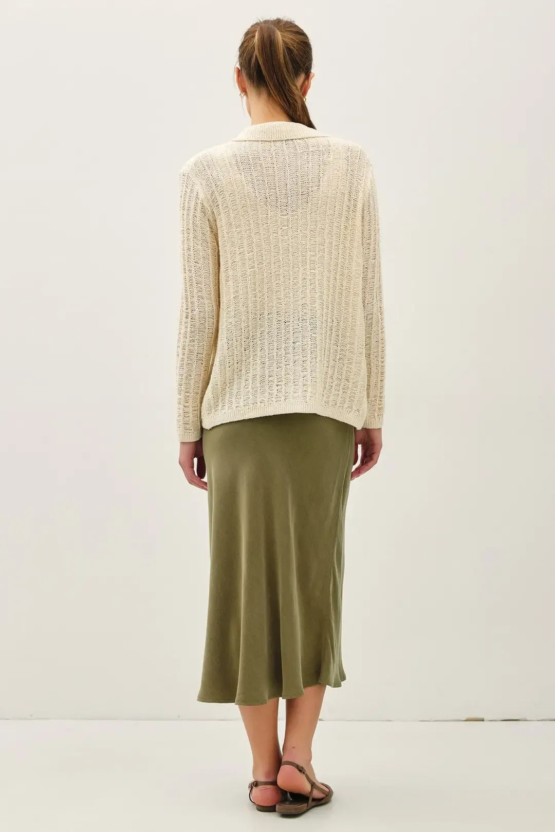 Cream-colored ribbed breezy textured knit collared cardigan