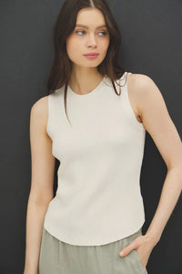 Cream-colored fitted ribbed tank top with rounded neckline