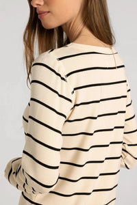 Cream-colored ribbed long sleeve basic stacy top with bold black horizontal stripes from basics collection