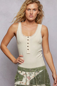 Cream-colored ribbed boho henley scooped tank top with lace trim and black button details in soft fabric