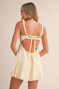 Cream-colored cotton mini dress with shirring bra detail sleeveless ruched back and tied straps bra cotton mini design