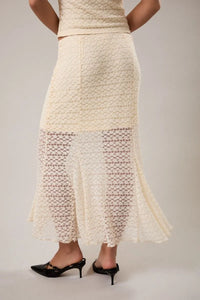 Cream-colored textured crochet mid rise midi skirt with flared hem and sheer lace panels midi half lined design