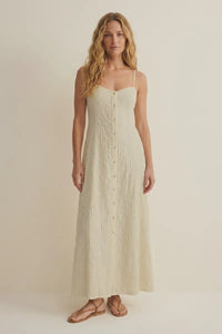 Cream-colored angel eyes textured midi dress with thin spaghetti straps and front button closure in textured fabric