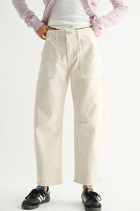 Cream-colored utility seamed barrel jean with wide-leg cargo pockets