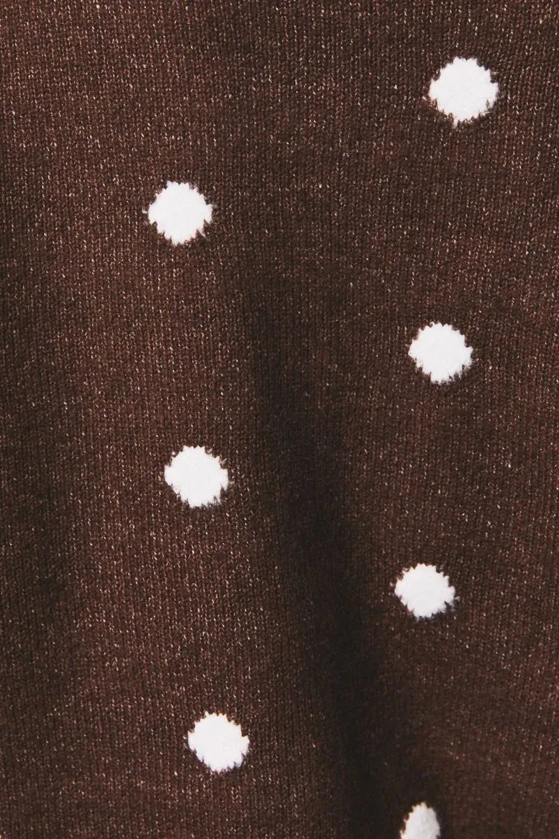 Brown knit crew neck sweater cardigan with white polka dot pattern showcasing soft textured fabric close-up