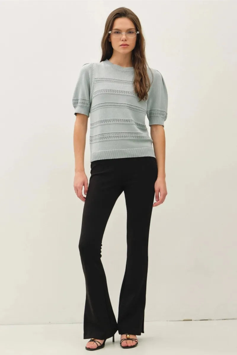 Light blue knitted crochet striped puff sleeve sweater with short puffed sleeves and horizontal lace detailing