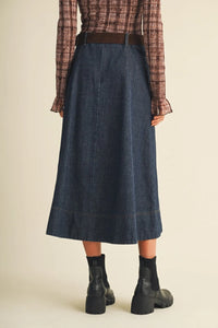 Dark blue denim belted indigo maxi skirt with a straight cut and subtle stitching details