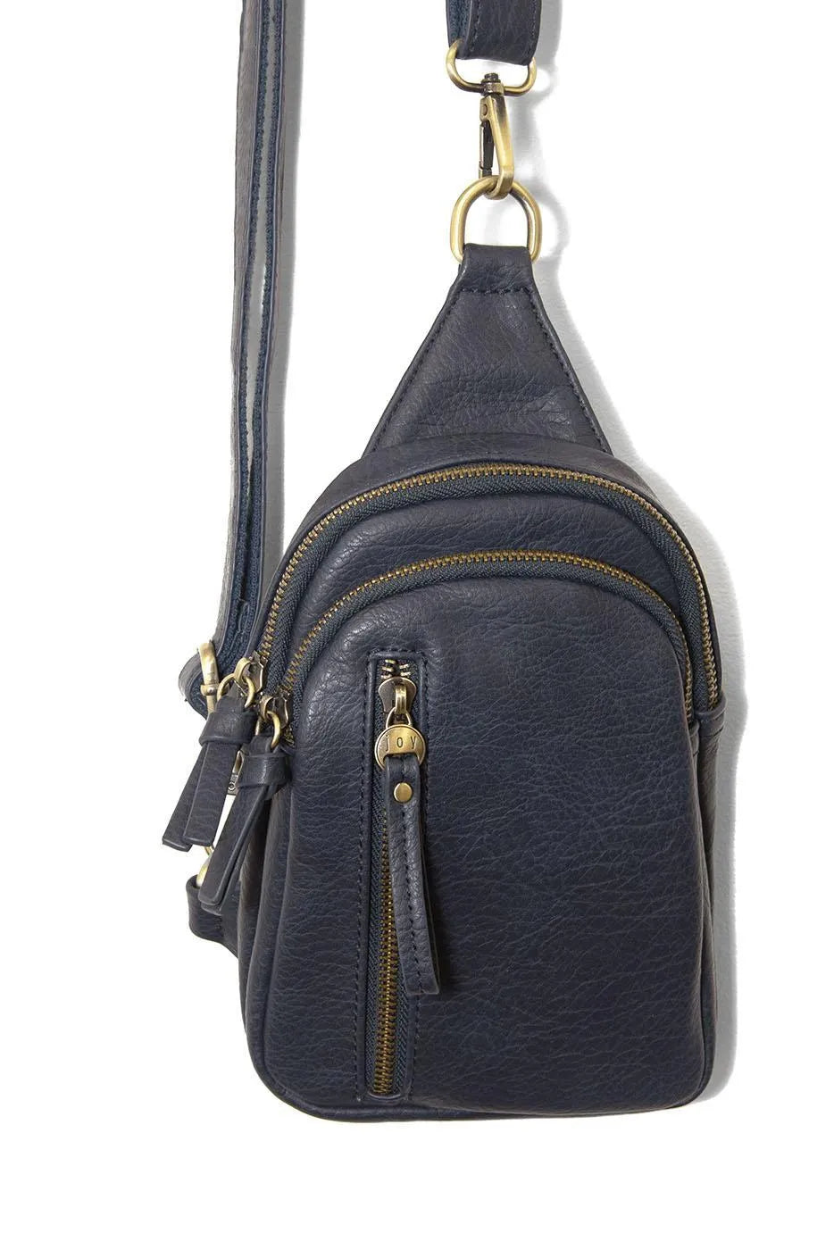 Skyler sling bag is a dark blue leather crossbody bag with multiple compartments and gold-tone hardware