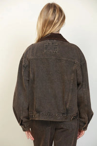 Dark brown oversized trucker denim jacket with contrasting corduroy collar and visible stitching details