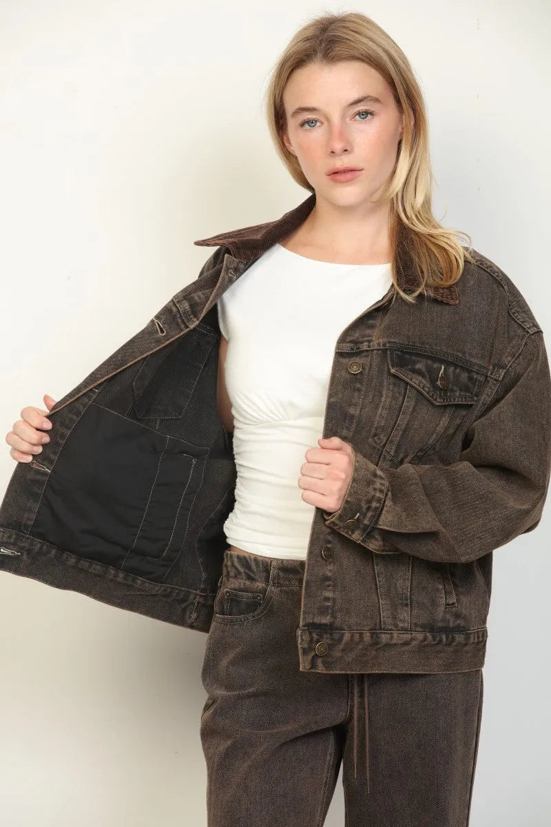 Dark brown oversized trucker denim jacket with contrasting black interior lining made from durable denim material
