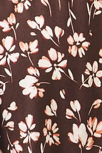 Dark brown midi skirt with floral smocked waistband featuring soft pink and white delicate floral pattern