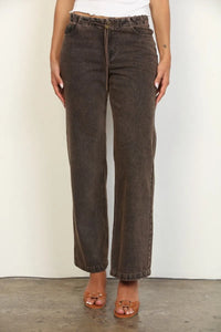 Dark brown overdyed straight leg denim jeans with faded wash and classic five-pocket design in wide-leg style