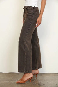 Dark brown overdyed straight leg denim jeans with wide-leg fit and drawstring waistband in cotton material