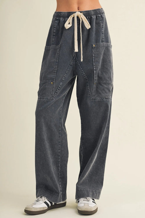 Dark gray corduroy drawstring waist wide leg utility pants with multiple pockets for functional style