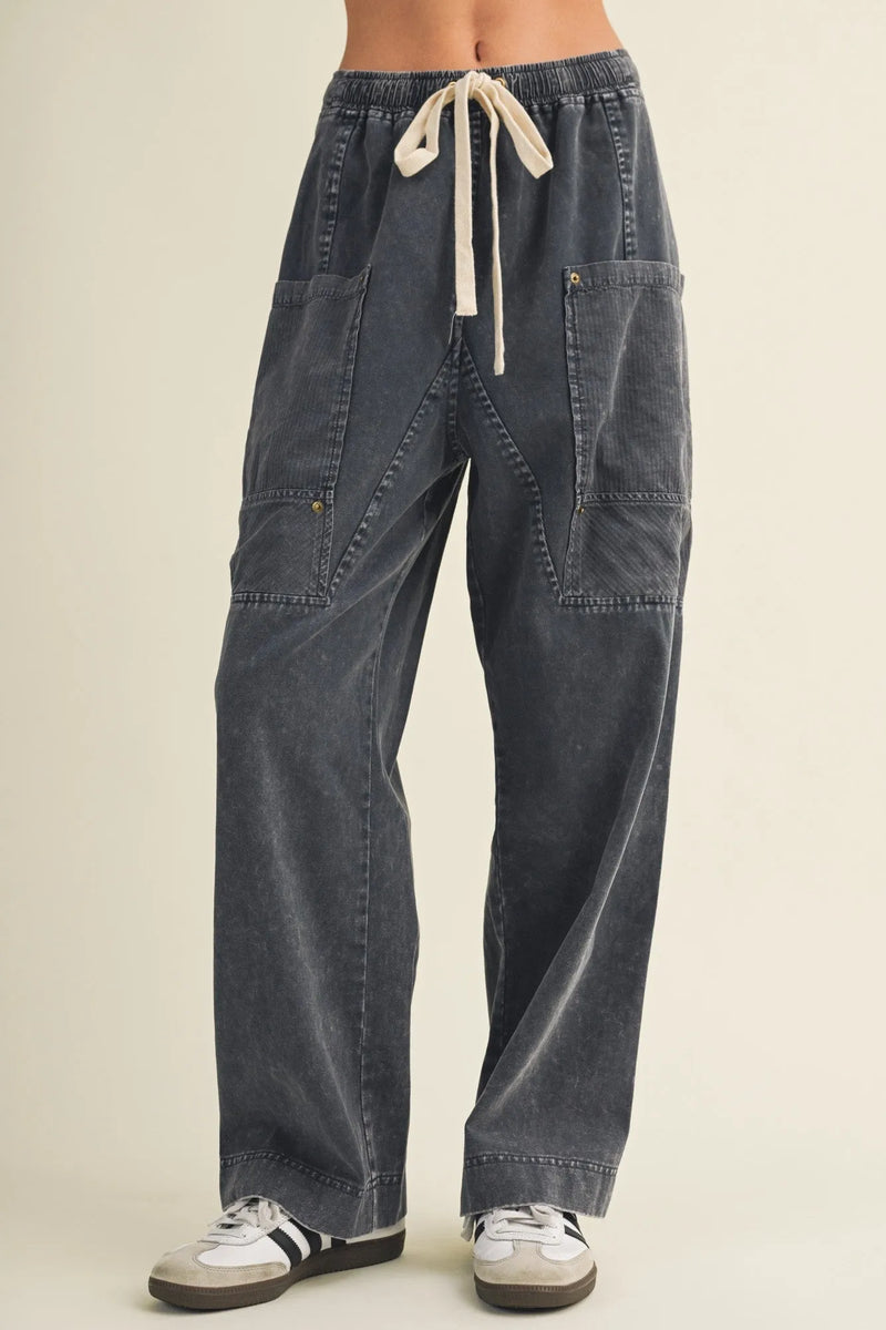 Dark gray corduroy drawstring waist wide leg utility pants with multiple pockets for functional style