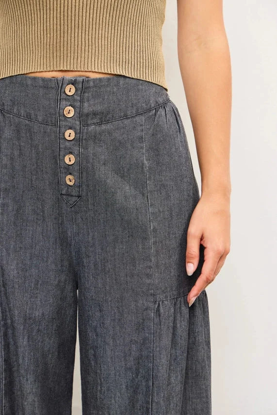 Dark gray high-waisted tiered wide pants with button front and pleats