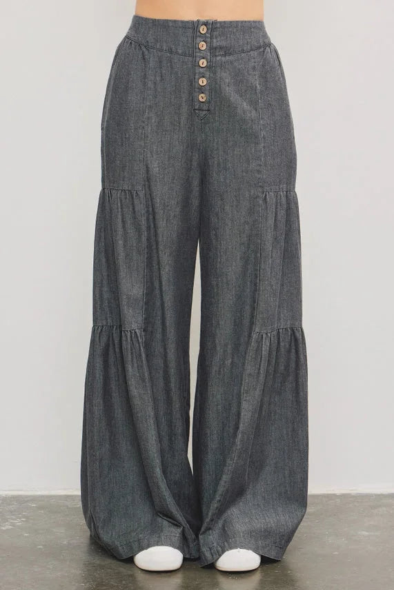 Dark gray denim tiered wide pants with button-front and ruffles