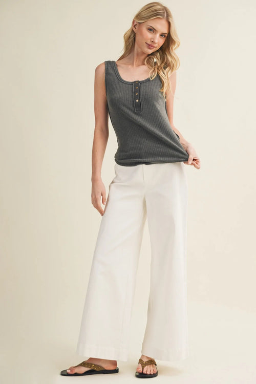 A dark gray sleeveless deconstructed vertebral seam ribbed tank top with button-down front detailing