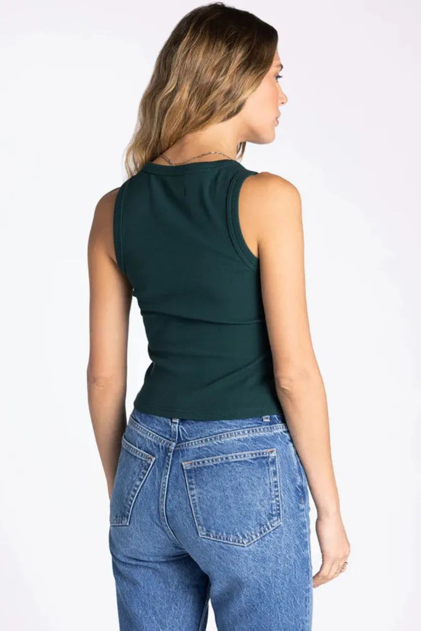 Dark green fitted sleeveless top with subtle seam detailing thread and supply evie basic tank for casual wear