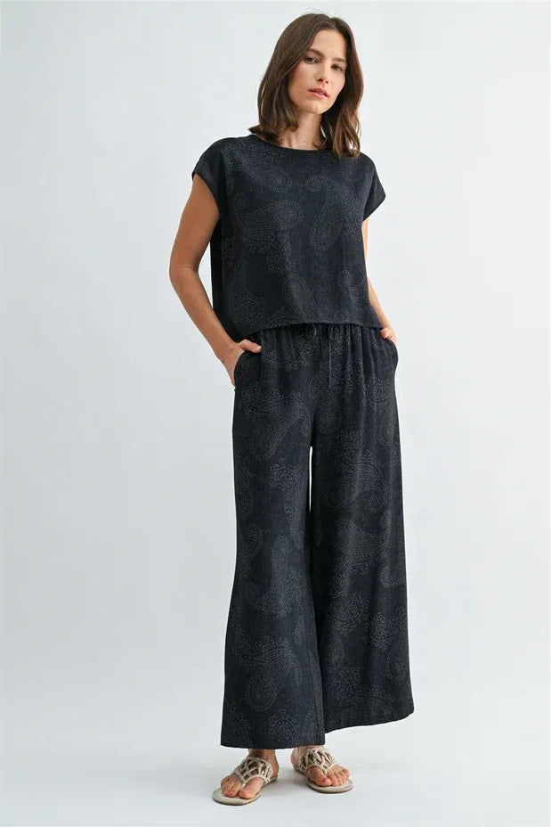 Dark navy blue paisley printed elastic waist pants with matching short-sleeved top featuring subtle paisley pattern