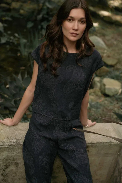 Dark navy blue linen jumpsuit with subtle paisley printed wide shoulder design for elegant wear