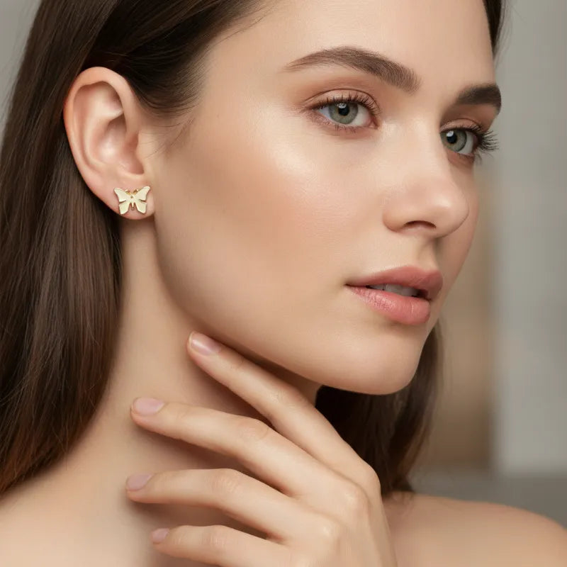 Delicate gold plated butterfly stud earring with minimalist design from chic nature inspired plated butterfly earrings collection