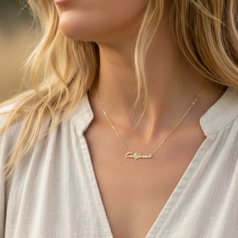 Delicate California handwritten pendant necklace with cursive engraving on gold chain