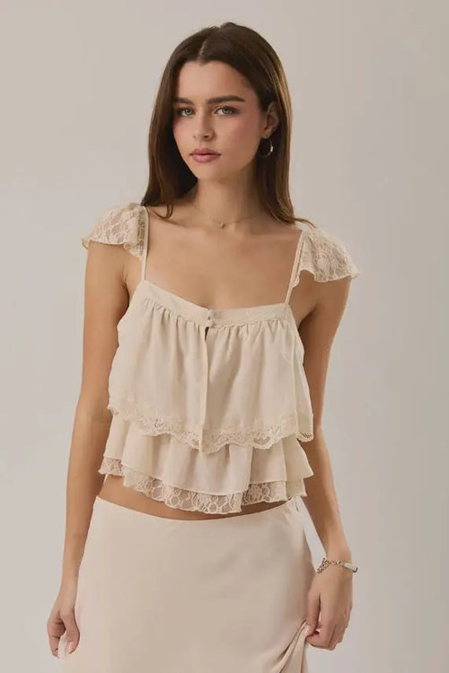 Off-white lace trim layered crop top with delicate lace trim ruffles and thin straps for elegant summer wear