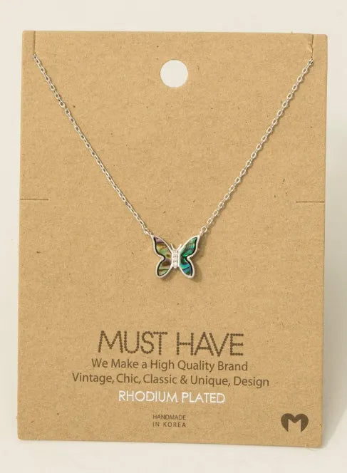 Gold dipped mini butterfly pendant necklace with rhodium-plated enamel wings