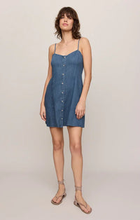 Angel eyes denim mini dress featuring a button-front design with thin straps and a flattering fit in denim blue