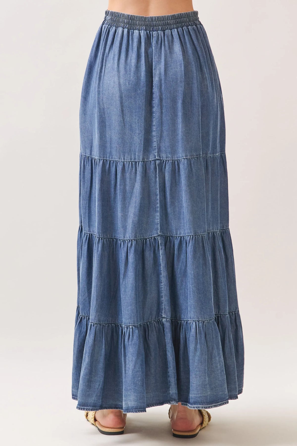 Denim tiered maxi skirt with relaxed fit and tencel elastic waisted design for comfortable all-day wear