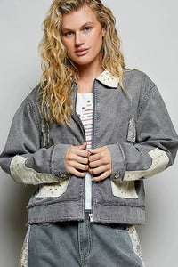 Bohemian vintage wash denim jacket with distressed gray denim body and cream patchwork sleeves and collar with zipper front