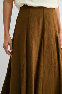 A flowing earthy-brown textured fabric godet midi skirt with pleats and side zipper for elegant wear