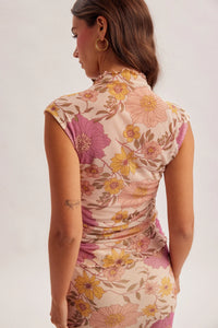 A fitted flora ruched sleeveless mesh top in soft beige with vibrant pink and yellow floral patterns