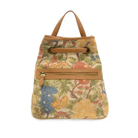 Memphis canvas backpack with floral pattern, tan leather handles, and zipper accents in durable canvas material