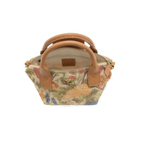 Abilene canvas mini tote crossbody with floral pastel fabric and tan leather handles and trim in canvas material