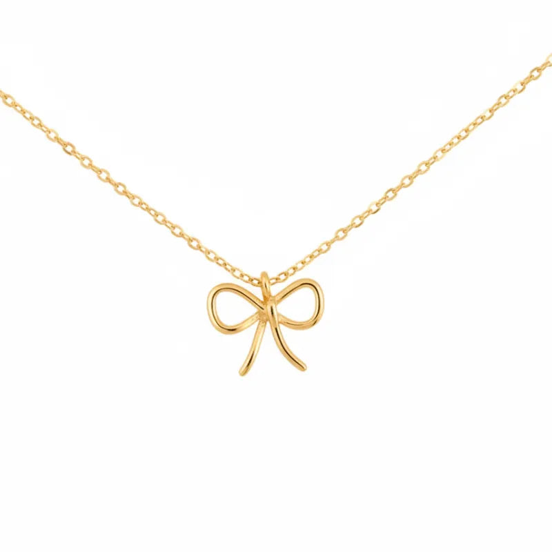 Gold dipped wire ribbon bow pendant necklace in gold color