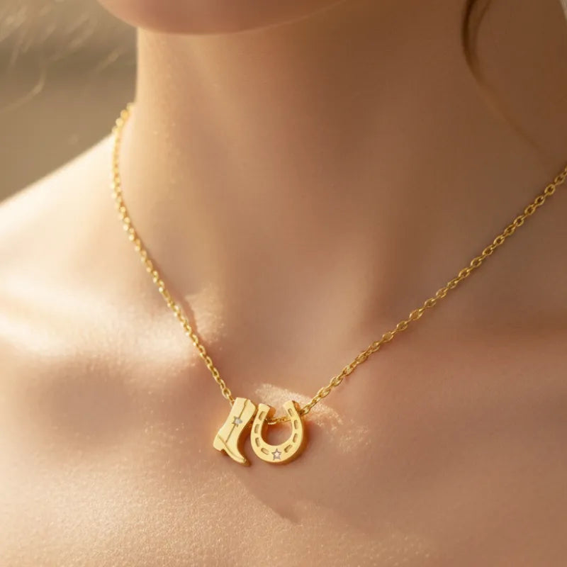 Gold dipped cowboy boots horse shoe charm necklace with star accents