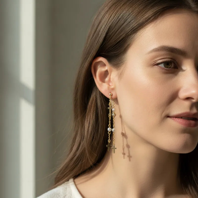 Gold filled layered cross pearl beaded drop earrings with chic gold toned chains featuring pearls and cross charms