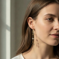 Gold filled layered cross pearl beaded drop earrings with chic gold toned chains featuring pearls and cross charms