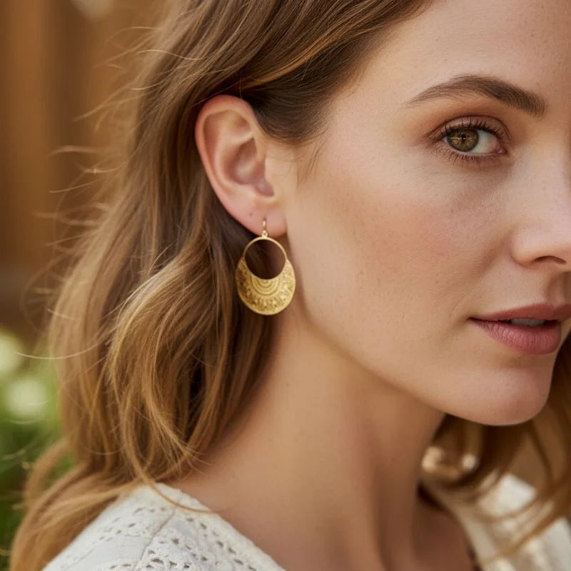 Boho filigree metal drop earring in gold tone with embossed patterns