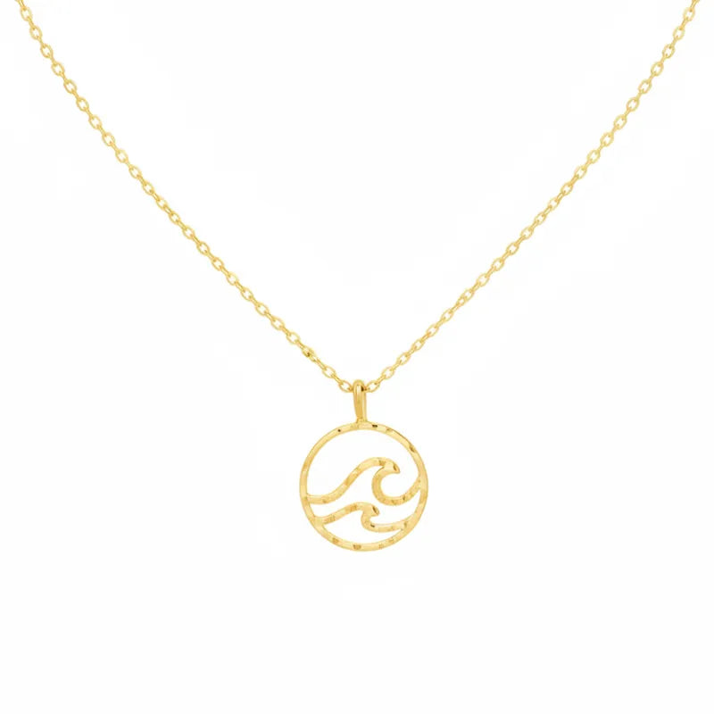 Gold dipped wave coin pendant necklace with intricate design