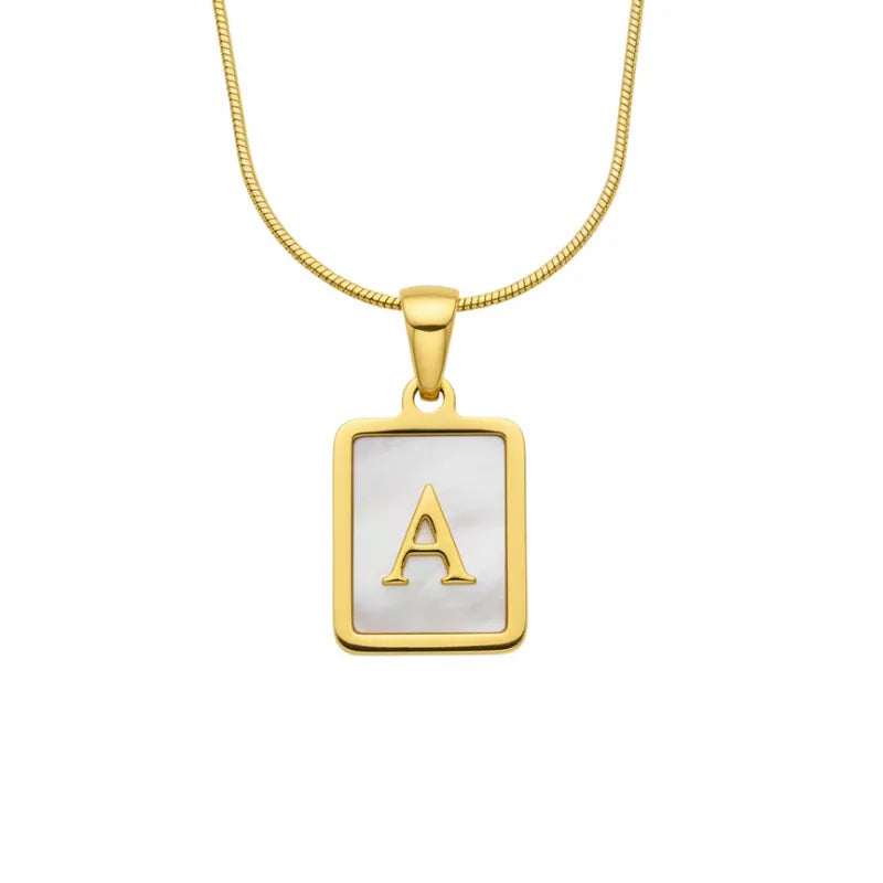 Gold-toned rectangular initial gold necklace with mother of pearl inlay and embossed letter a centerpiece