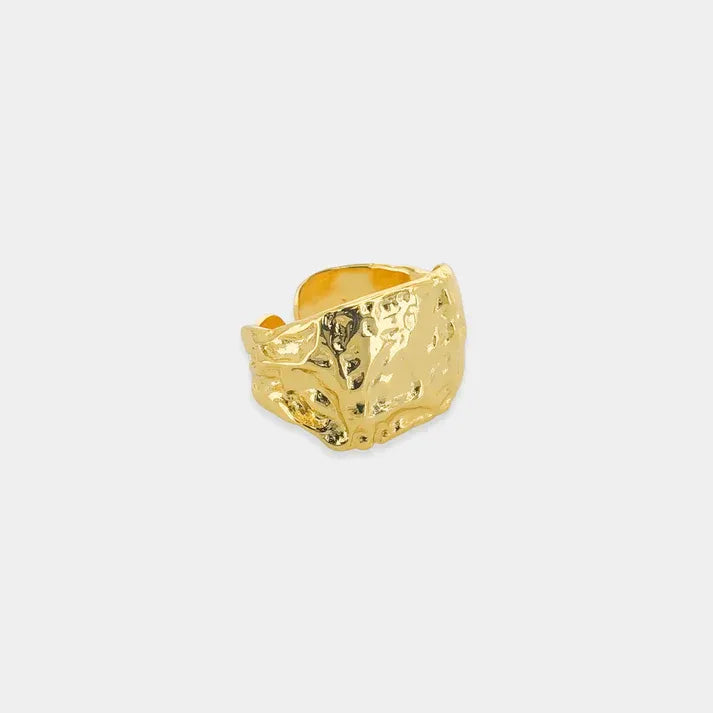Open hammered textured gold ring with raw metal band