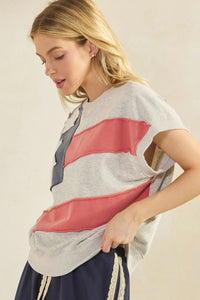 Gray mineral wash t-shirt with american flag patch featuring pink and navy blue patchwork stripes