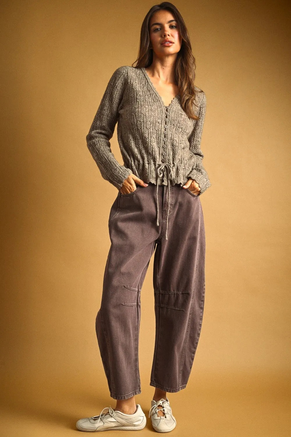 Gray lace knit waist knit cardigan with button closure and drawstring waist in textured knit fabric