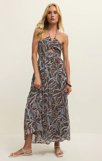 Lanie Zinn floral maxi dress featuring a dark gray and muted blue halter neck with a ruched waistband