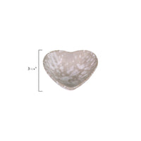 Stoneware heart dish in speckled beige and white ceramic glaze measuring 3¼ inches in height
