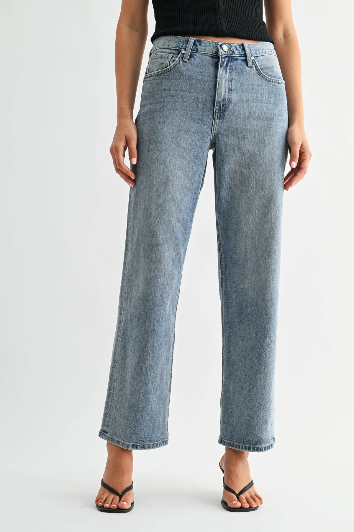 High-rise straight-leg light-wash blue denim jeans with button fly and five-pocket design from rise jb collection selvage jeans